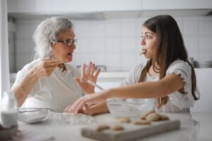 Grandma and daughter making cookies at the Long-term-care facility